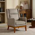 Fauteuil rembourré à dossier haut