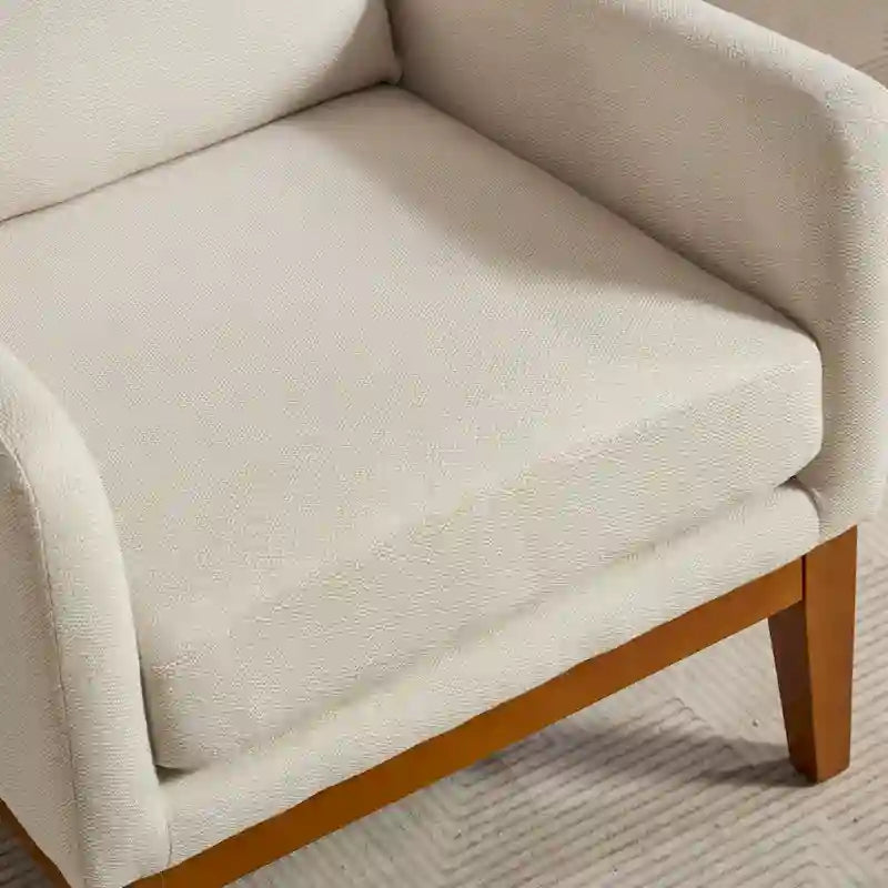 Fauteuil rembourré à dossier haut