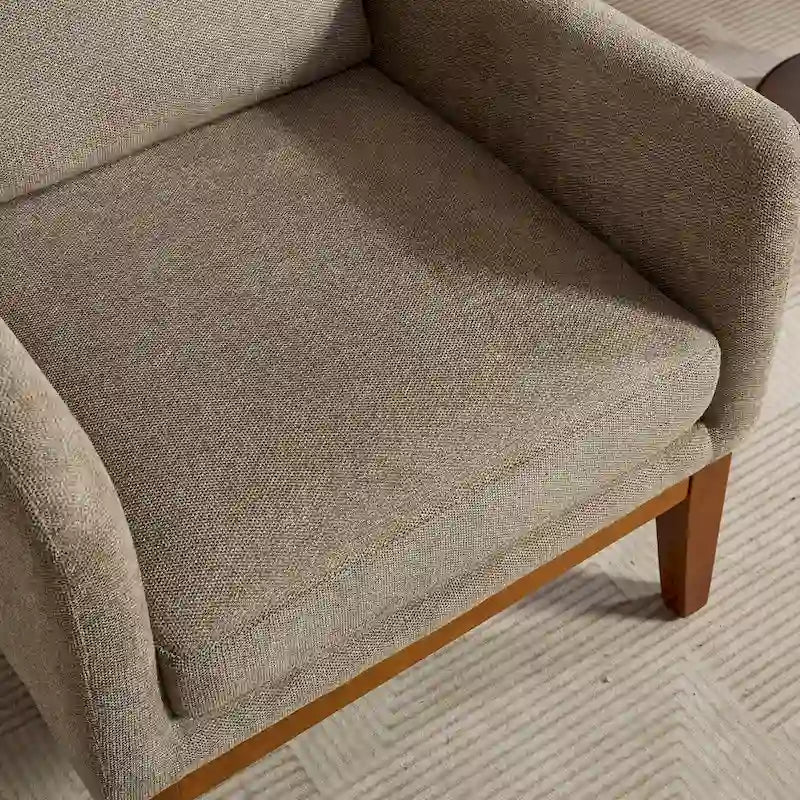 Fauteuil rembourré à dossier haut