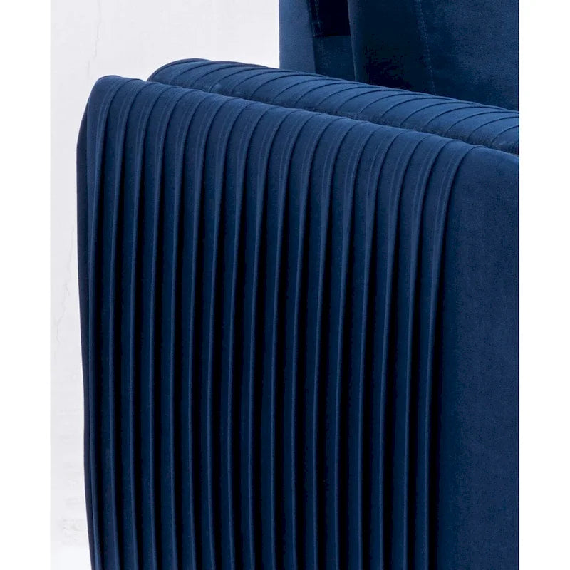 Fauteuil de salon capitonné en velours bleu de style moderne