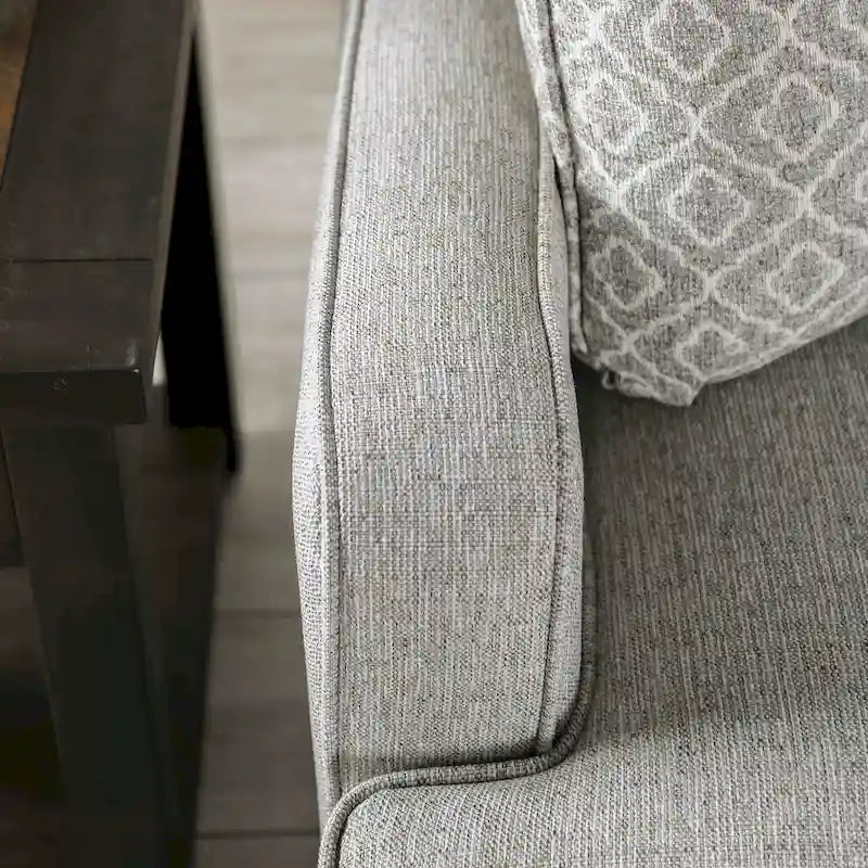Canapé en tissu gris de style transitoire