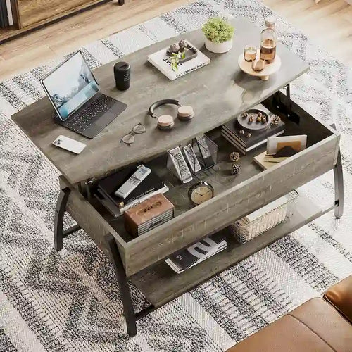 Table basse relevable avec un plateau ovale en bois