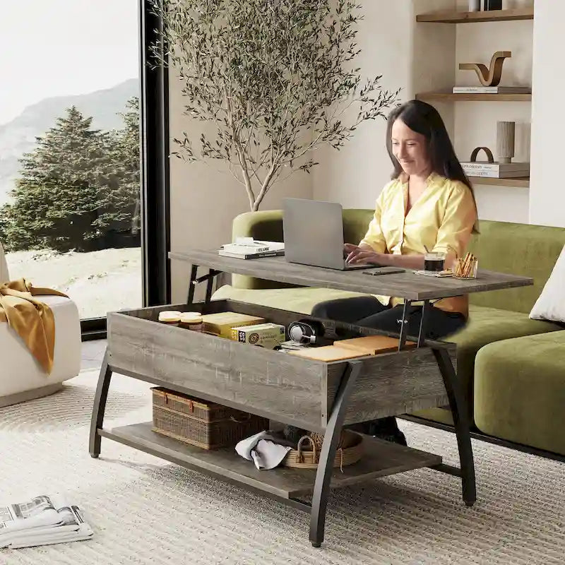 Table basse relevable avec un plateau ovale en bois